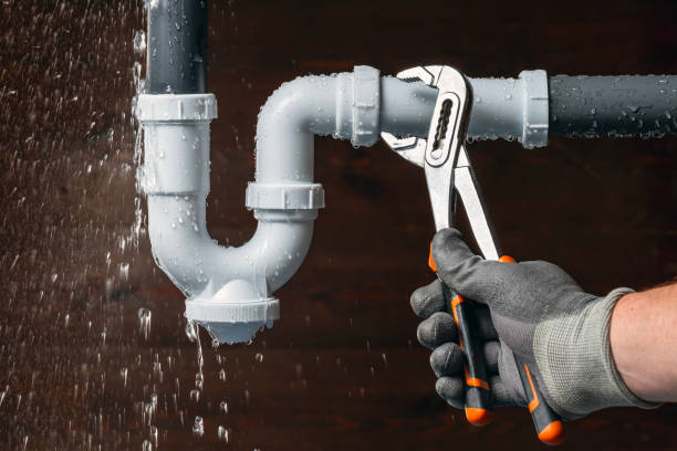Professional Emergency Plumber technician working in Oakham, MA